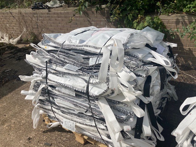 Plastic off-cuts held together for handling
